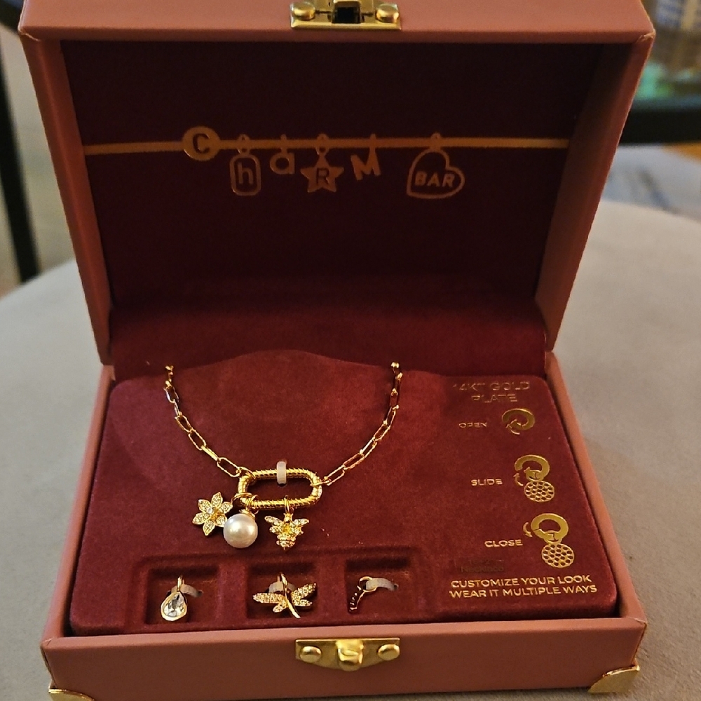 Elegant Gold Necklace with Pearl and Star Charms